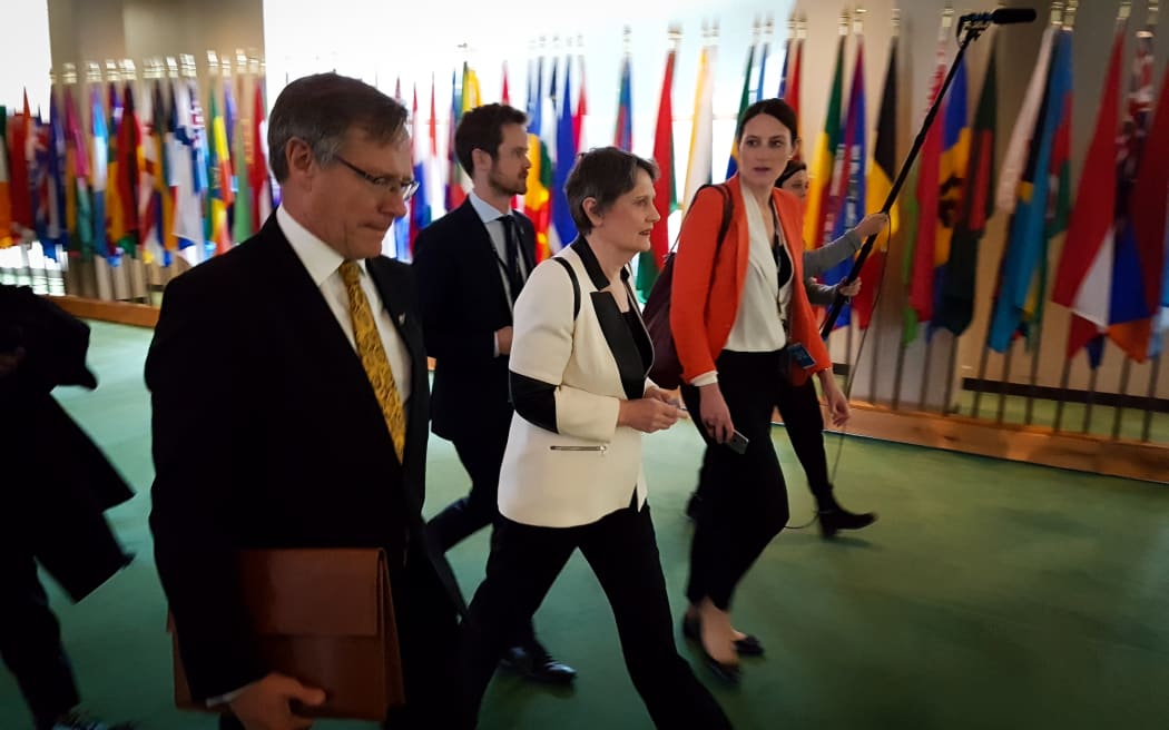 Helen Clark leaving the UN in a hurry to catch a train to D.C.