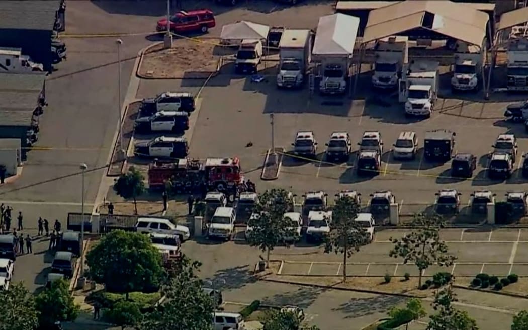 A fire truck and police are seen at a Los Angeles County Sheriff's Department training facility in Monterey Park, California, where a deadly explosion occurred on July 18.