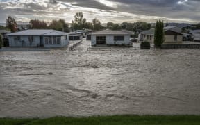Houses on College Road, opposite the stopbank wall on the river Rangataiki that breached and flooded the majority of the town causing the evacuation of 1600 residents.  Thursday 6 April 2017