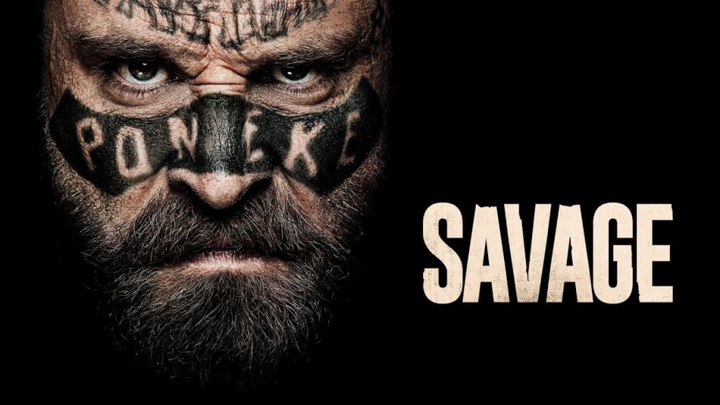 Savage film banner