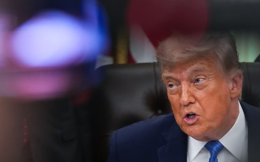 US President Donald Trump speaks during a signing ceremony for the “Secure America Act” in the Oval Office of the White House in Washington, DC, on June 10, 2026. The bill provides around $38 billion for Immigration and Customs Enforcement (ICE), $26 billion for Border Patrol and another $5 billion for unforeseen costs, effectively ensuring a steady flow of money for Trump’s deportation agenda through fiscal 2029. (Photo by Ken Cedeno / AFP)