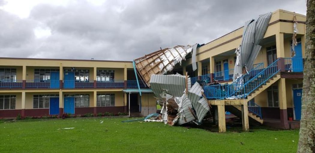 A roof is blown off a school in Nausori during Cyclone Harold.