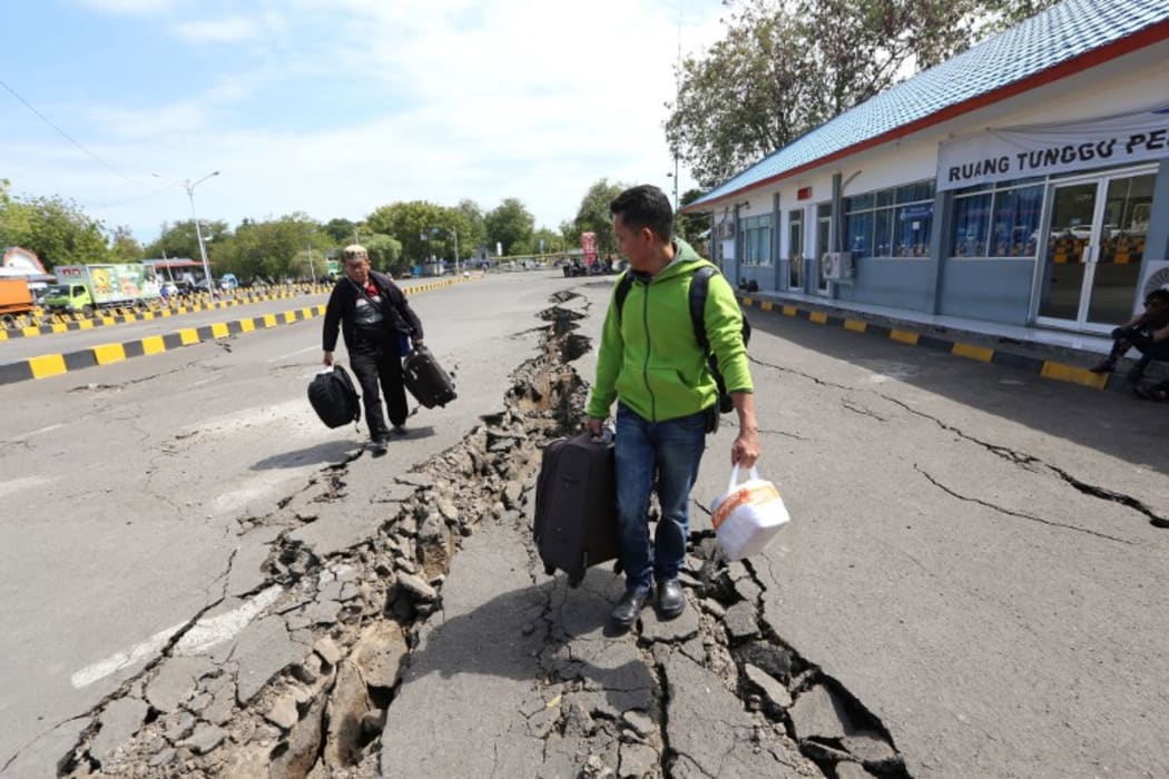 A series of powerful earthquakes have rocked the Indonesian holiday island of Lombok, killing at least 10 people and setting off fresh waves of panic after nearly 500 died there following a huge tremor two weeks ago.