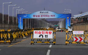 A barricade is set on the road leading to the truce village of Panmunjom at a South Korean military checkpoint near the Demilitarized Zone (DMZ).