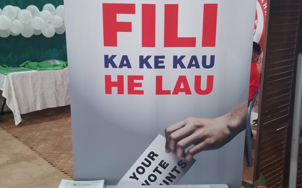 A Tonga Electoral Commission banner with the message: "Vote so you can be counted".