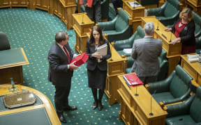 Grant Robertson and Prime Minister Jacinda Ardern enter The House to deliver Budget 2020.