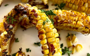 Roasted sweetcorn ribs with chilli-honey butter.