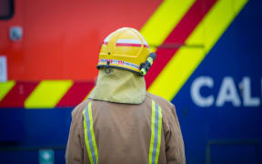 A firefighter on scene at an incident. 6 July 2016.