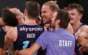Tom Abercrombie of the New Zealand Breakers celebrates with his teammates after scoring the winning basket during the NBL match between the New Zealand Breakers and the Cairns Taipans at John Cain Arena on March 10, 2021 in Melbourne, Australia.  Â© Copyright Photo: Scott Barbour/ www.photosport.nz
