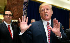 US President Donald Trump, after making comments that "both sides' were responsible for violence in Virginia.