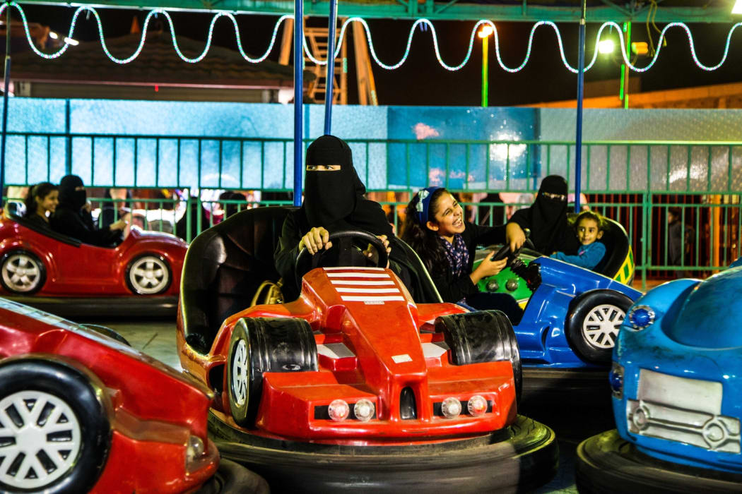 To mark the 125th anniversary of women's suffrage in New Zealand, the City Gallery presented the work of a woman artist from the last country to give women the vote, Saudi Arabia. Arwa Alneami’s images are of Saudi women at an amusement park.