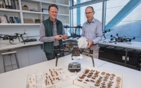 Dr Stephen Pawson, left, and Dr Graeme Woodward are using tech to track insects using drone mounted radar.