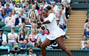 6th July 2019, The All England Lawn Tennis and Croquet Club, Wimbledon, England, Wimbledon Tennis Tournament, Day 6; Serena Williams (USA) with a forehand during her mixed doubles match with Andy Murray
