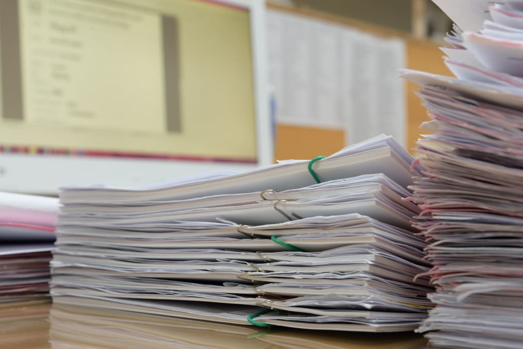 a file folder with documents and important documents