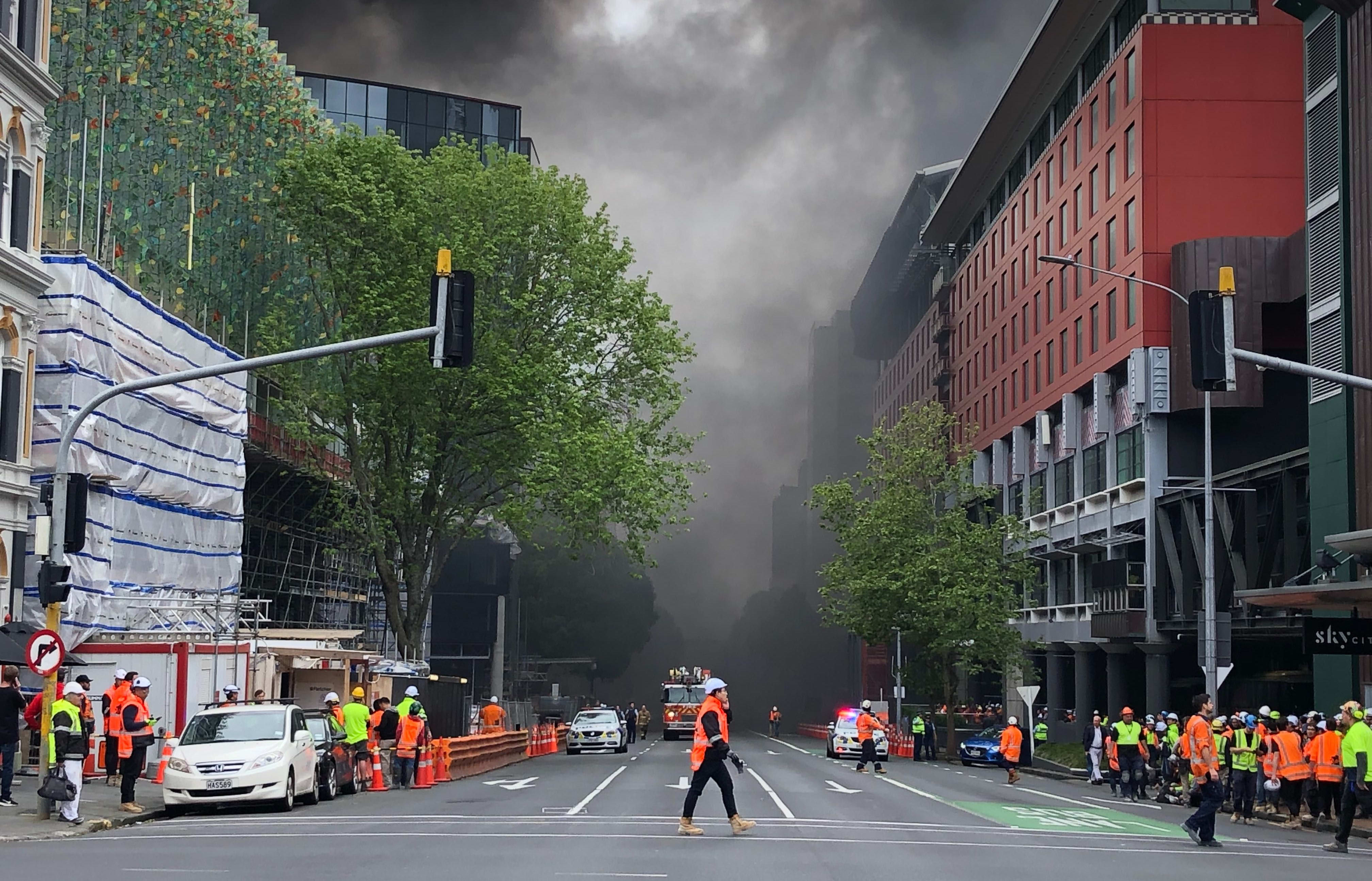 Smoke can be seen billowing in the air.