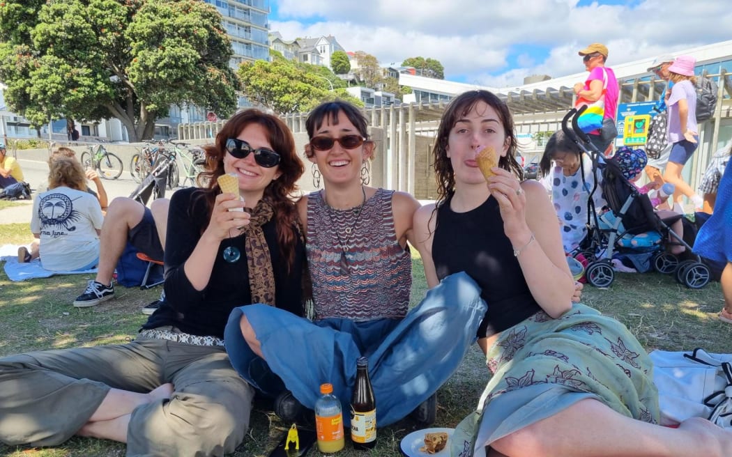 Friends Amy Hartwell, Iris Garstang and Olivia Ferguson cool off with a gelato and some shade at Freyberg Beach.