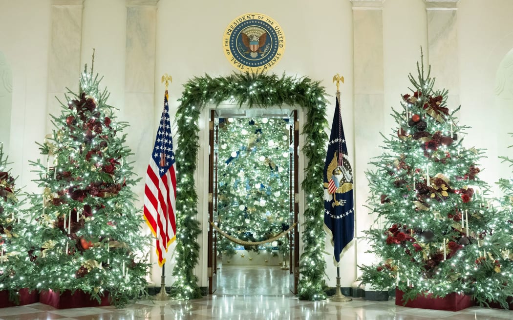 Christmas decorations are seen in the Grand Foyer of the White House during a media tour on Monday, 1 December 2025.