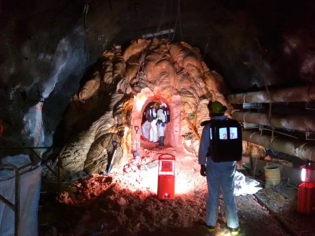PRRA workers measuring the Rocsil plug tunnel.