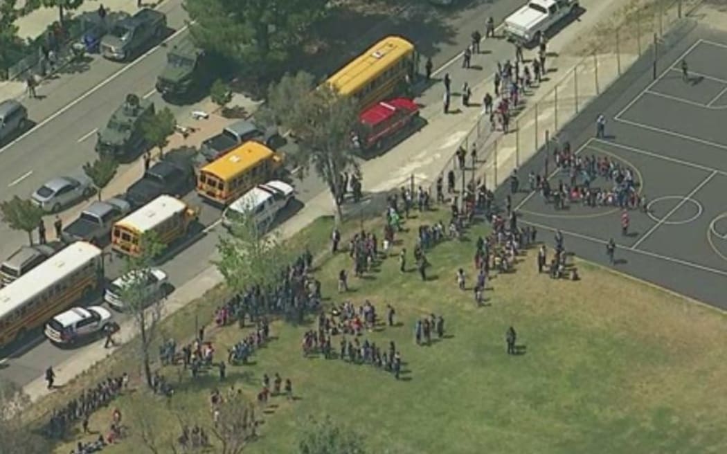 The screenshot from ABC News reportedly shows the students who have evacuated from the San Bernardino school after the shooting.
