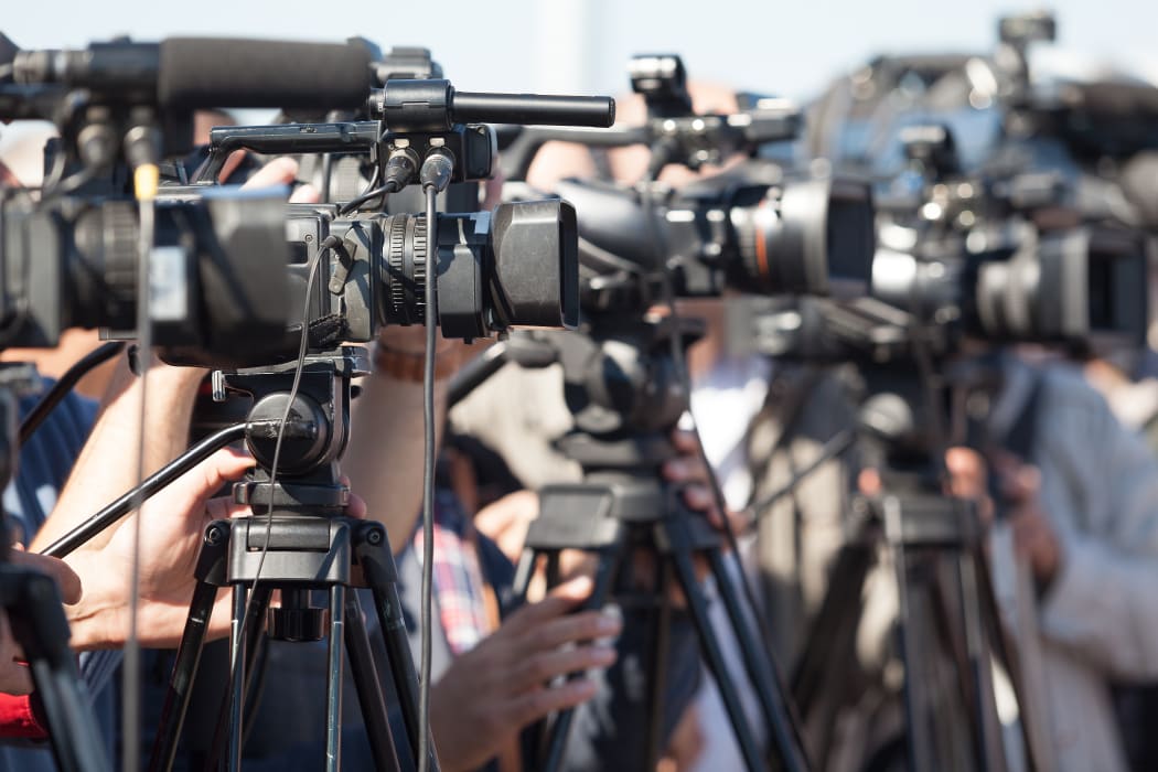 Covering an media event with a video camera
