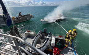 Fire on launch extinguished on Auckland's Hauraki Gulf, near Browns Island.