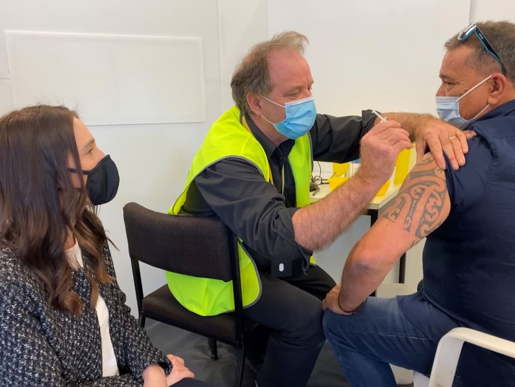 Bernie Edwards had Prime Minister Jacinda Ardern as personal escort for his first Covid jab