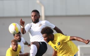 Fiji's Dave Radrigai battles for the ball with Solomon Islands' Javin Wae in Lautoka on Sunday