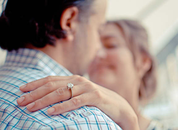 Couple embracing.