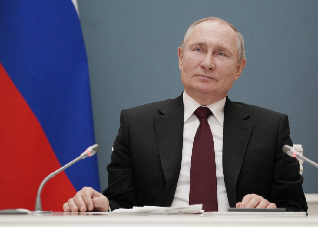 Russian President Vladimir Putin attends a launching ceremony of the Talas Gold Mining complex in the north-west of Kyrgyzstan, via video link at the Kremlin in Moscow, Russia.
