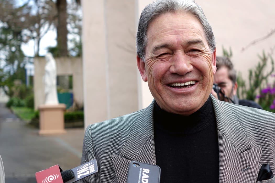 Winston Peters speaks to media after voting in Auckland.