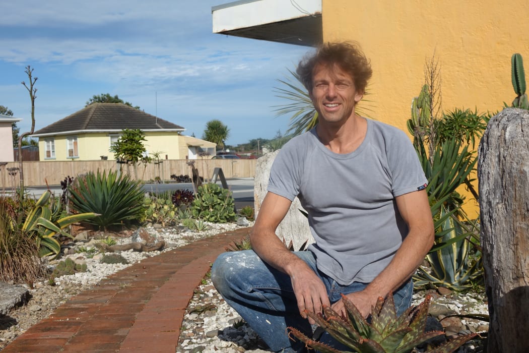 Gallery owner Ivan Vostinar takes pride in tending to the succulents planted along Rangiora Street as part of the Castlecliff Rejuvenation Project.