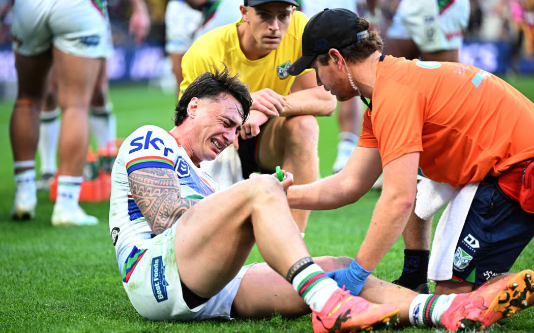 Charnze Nicoll-Klokstad of the Warriors sustains an injury during the NRL Round 17 match between the Brisbane Broncos and the New Zealand Warriors.