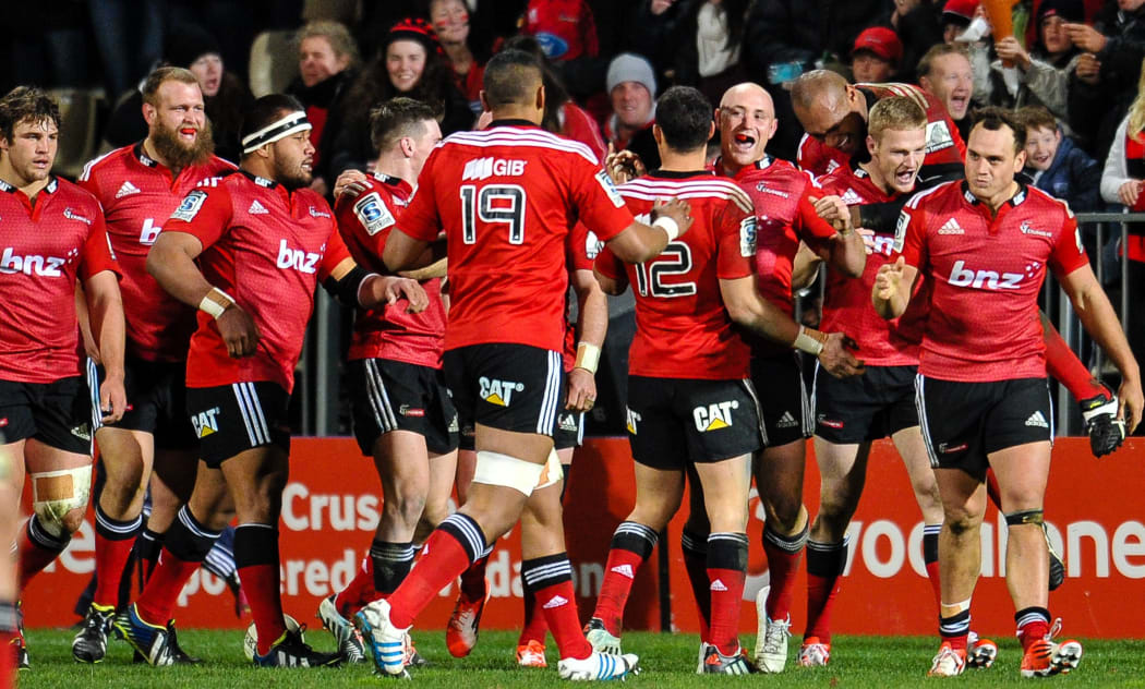 The Crusaders celebrates Johnny McNicholl of the Crusaders try in the Super Rugby Semi Final match, Crusaders v Sharks, Christchurch, July 2014.