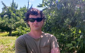 Luke Condon in the orchard.