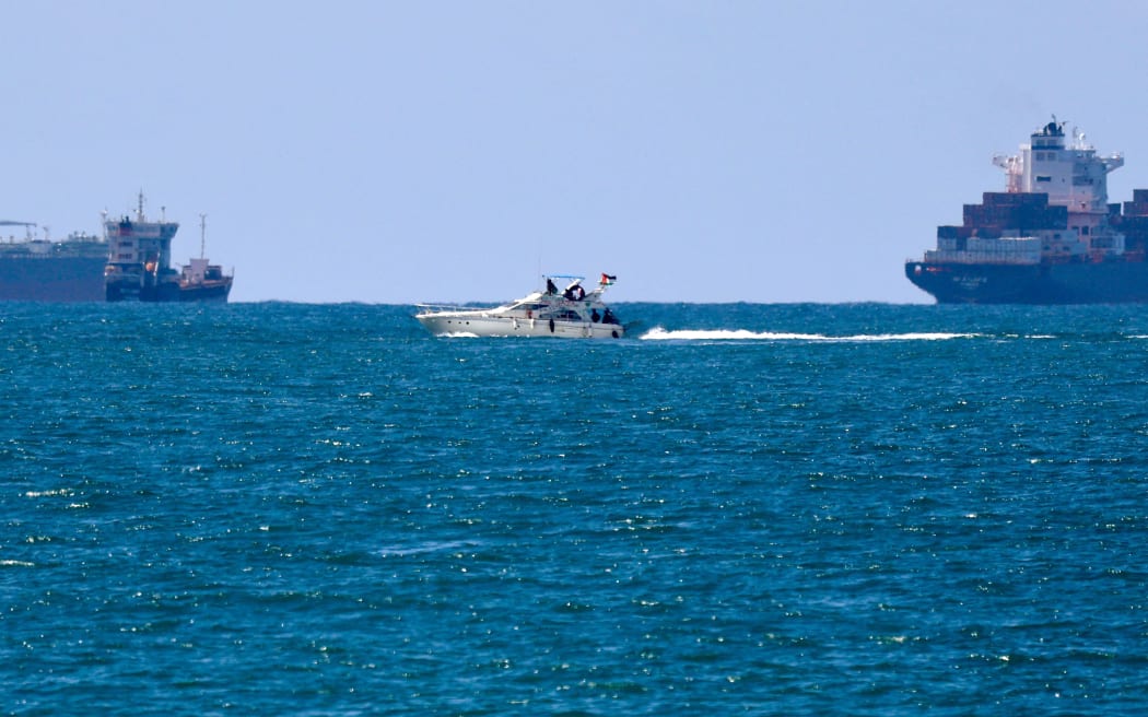 A boat from the Global Sumud Flotilla intercepted by Israeli forces in the Mediterranean sea off the Gaza Strip waters, is escorted towards the southern port of Ashdod on 2 October, 2025.