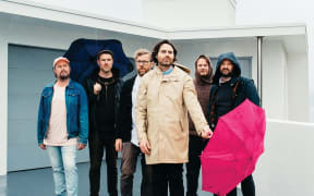 Phoenix Foundation 2023, left to right: Conrad Wedde, Tom Callwood, Chris O'Connor, Samuel Scott (with umbrella), Will Ricketts, Luke Buda.