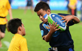 Kids playing rippa rugby