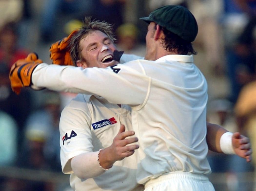 Warne celebrates with Adam Gilchrist Madras 2004.