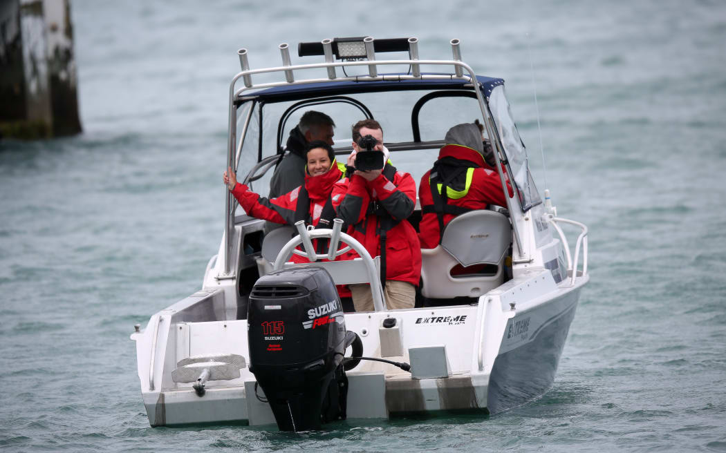 Greenpeace camera crew film the media filming the activists on board the government research ship Tangaroa in Wellington.