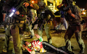 KENTUCKY, USA - SEPTEMBER 23: Police officers intervene in protesters in Louisville, Kentucky, on September 23, 2020, after a judge announced the charges brought by a grand jury against Detective Brett Hankison, one of three police officers involved in the fatal shooting of Breonna Taylor in March.