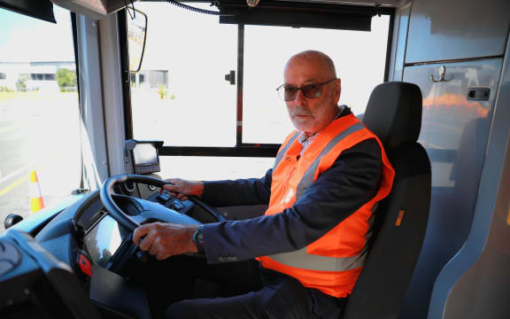 Auckland Mayor Wayne Brown tries out a new electric double decker bus