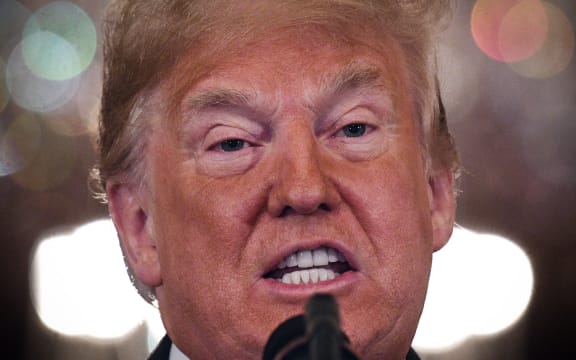 US President Donald Trump speaks during a post-election press conference in the East Room of the White House in Washington, DC on November 7, 2018. (Photo by Jim WATSON / AFP)