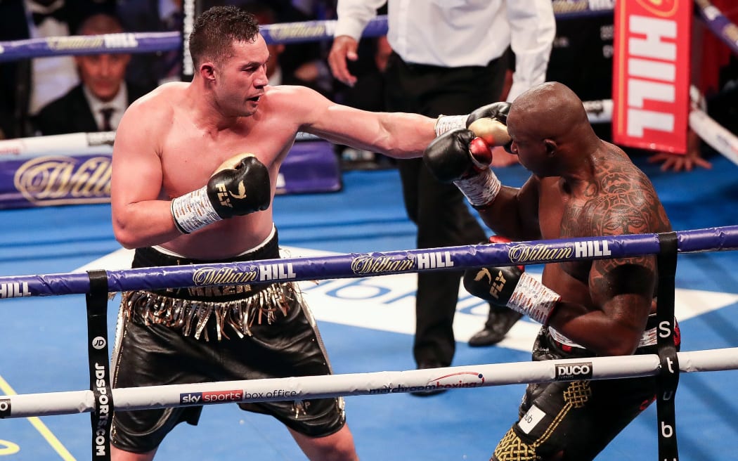 Joseph Parker presses forward against Dillian Whyte.
