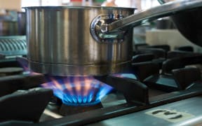 A pot on a gas-powered stove