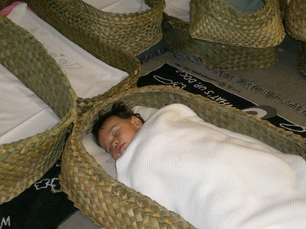 A baby in a wahukura (file photograph).