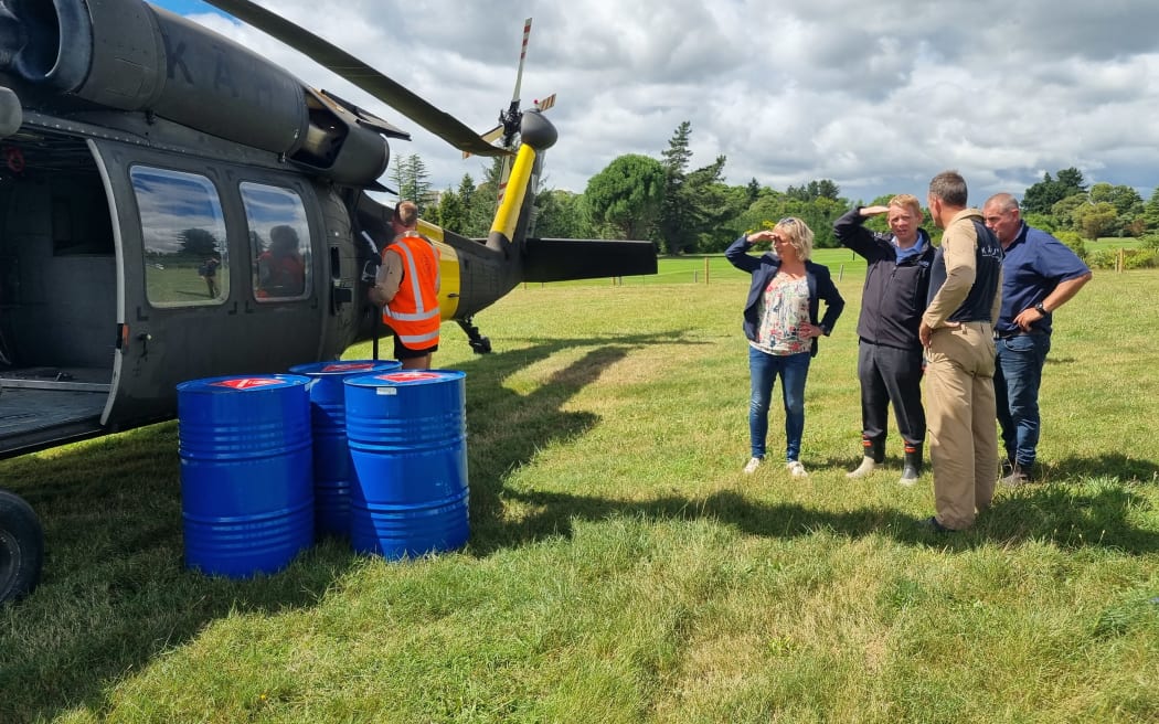 Tukituki MP Anna Lorck (left) and Prime Minister Chris Hipkins (second left) in Hawke's Bay on 1 March 2023.