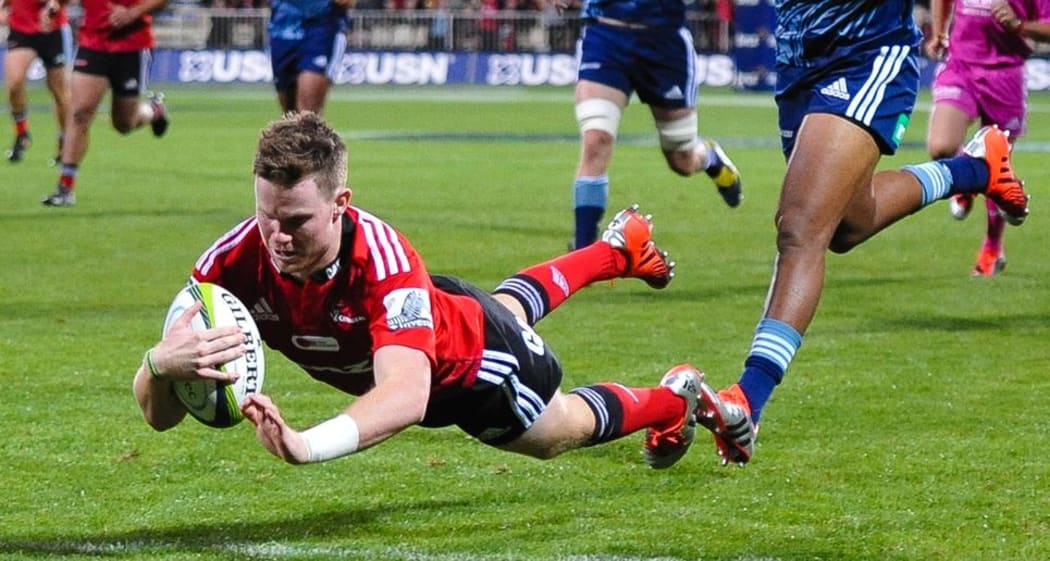 The Crusaders' Mitchell Drummond scores a try against the Blues, 25 April 2015 at AMI Stadium, Christchurch. Copyright Photo: John Davidson / www.Photosport.co.nz