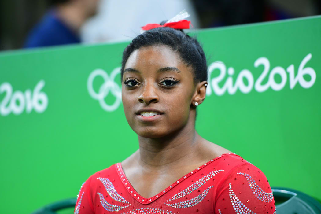 US gymnast Simone Biles attends a practice session of the women's Artistic gymnastics at the Olympic Arena on August 4, 2016 ahead of the Rio 2016 Olympic Games in Rio de Janeiro.