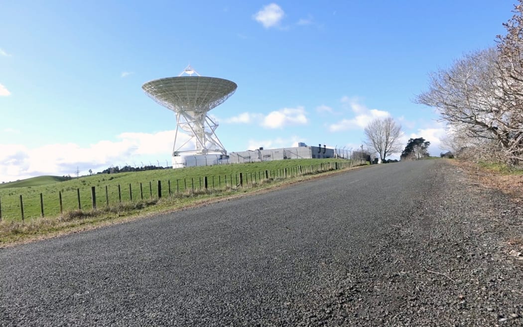 Sergei Gulyaev switches on the 30 metre radio telescope dish at Warkworth operated by AUT University's Institute for Radio Astronomy and Research.