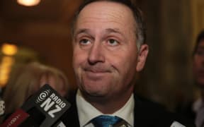 Prime Minister John Key talks to the media after the Budget.